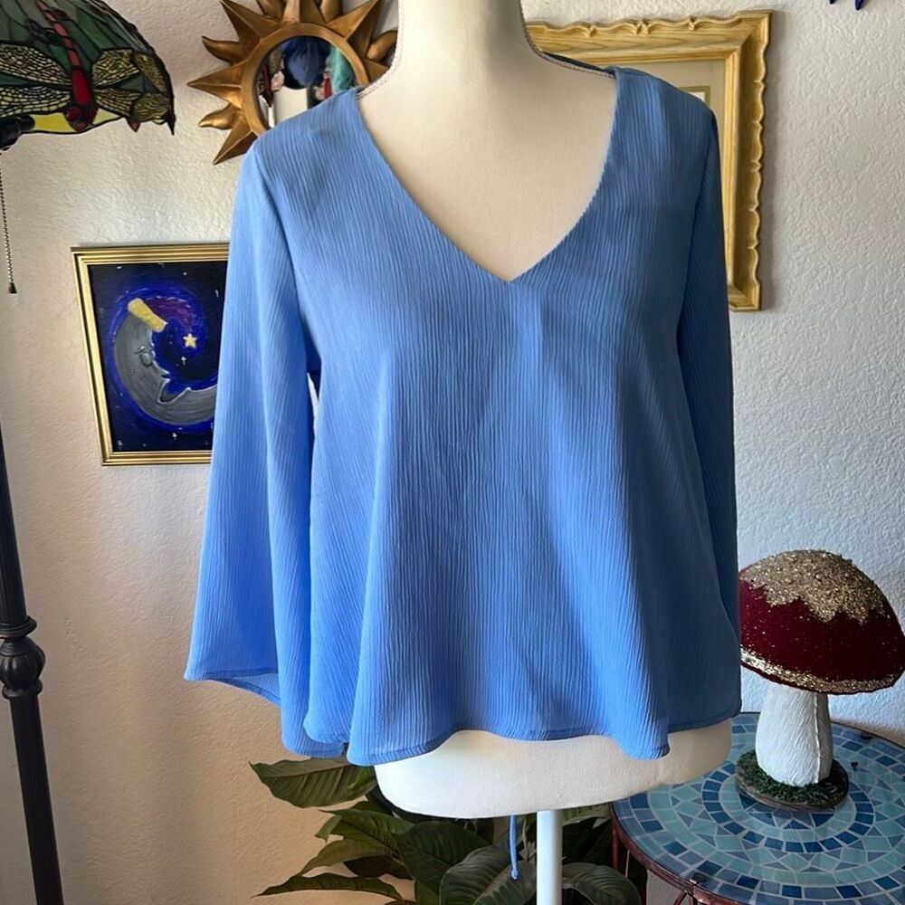 LUSH Size Small light blue long sleeve blouse